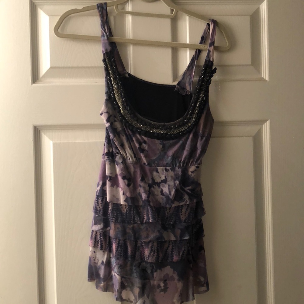 Embellished tank